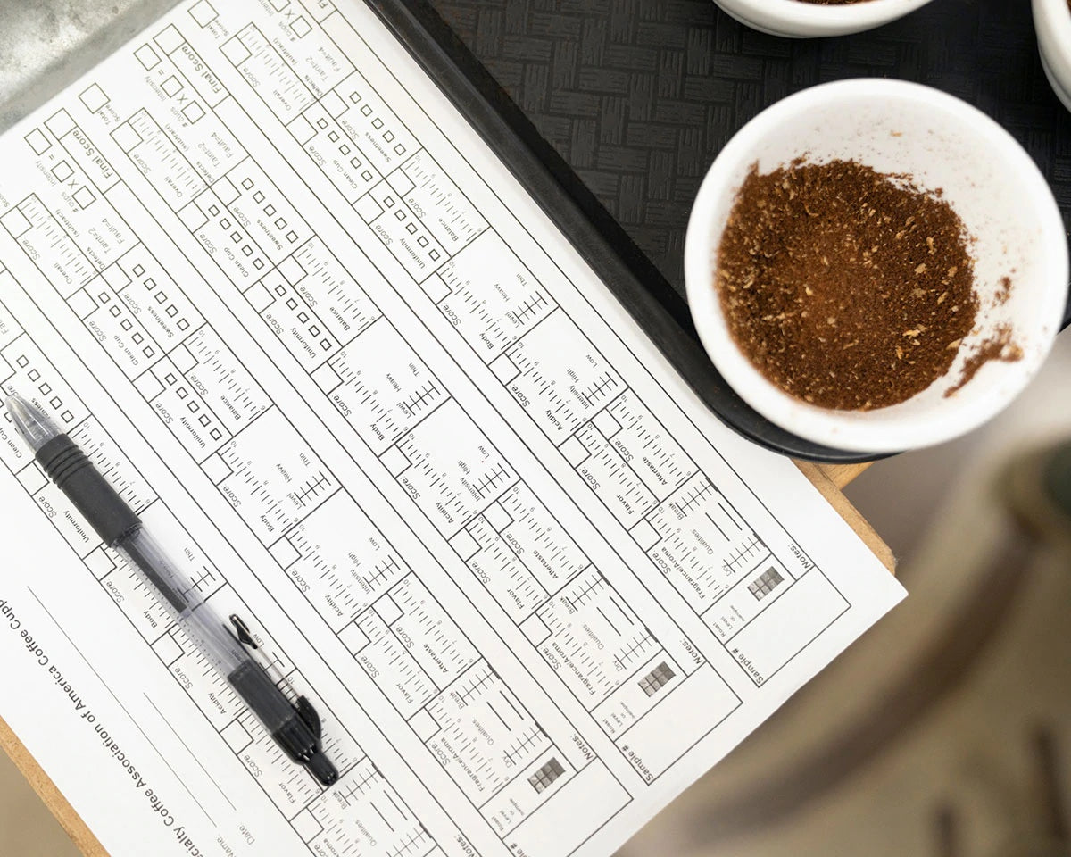 coffee grounds with rating sheet